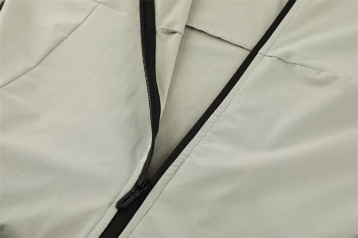 Custom Waterproof Lightweight Jacket for Unisex with Zip Pockets - Image 5