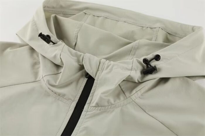Custom Waterproof Lightweight Jacket for Unisex with Zip Pockets - Image 6